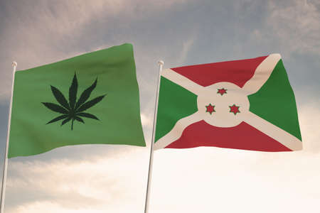 Interesting Flags of BURUNDI and that of the legalization of marijuana waving with the bright sky in the background.の写真素材