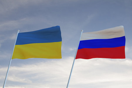 Flags of UKRANIE  and RUSSIA waving with cloudy blue sky background,3D renderingの写真素材