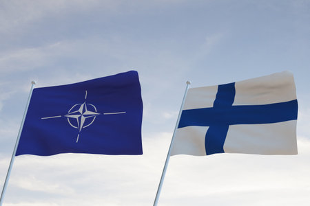 Flags of NATO and FINLAND waving with cloudy blue sky background,3D rendering WARのeditorial素材