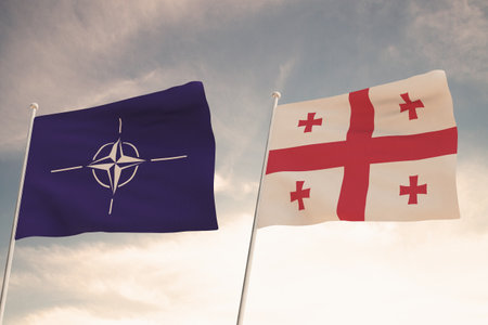 Flags of NATO and GEORGIA waving with cloudy blue sky background,3D rendering WARのeditorial素材