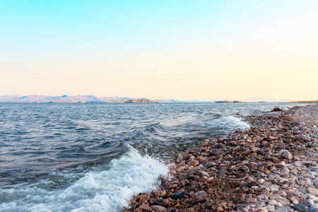 Waves hitting rocks on Lake Baikal