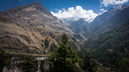 Himalayas mountains landscape with sky and cloundsの写真素材