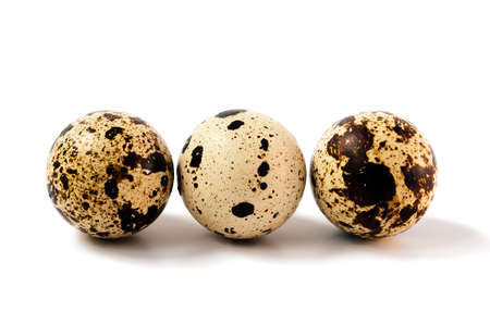 group of quail eggs isolated on white backgroundの写真素材