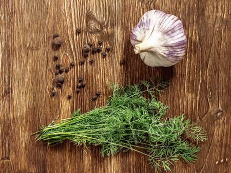 Garlic dill peppers arranged on the board top viewの写真素材