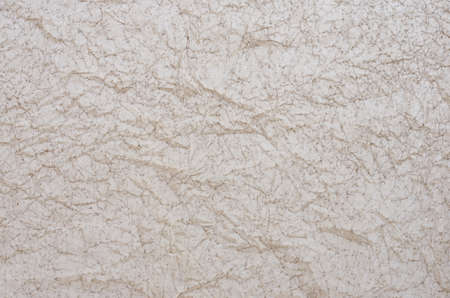 very old crumpled paper on skylight texture backgroundの写真素材