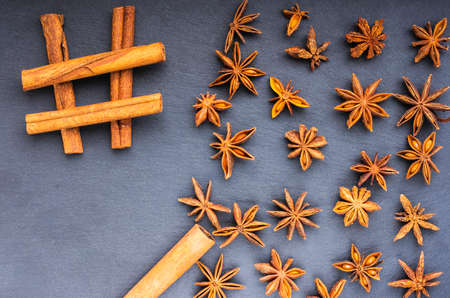 diez the cinnamon and star anise top view  on slateの写真素材