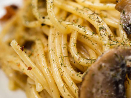 tasty Italian pasta with mushrooms close up.の写真素材