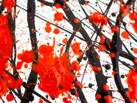Dripping black and red paint isolated on white background. Flowing fuel oil splashes, drops and...