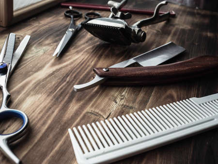 vintage barber shop tools on wood backgroundの写真素材