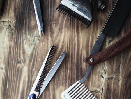 vintage barber shop tools on wood backgroundの写真素材
