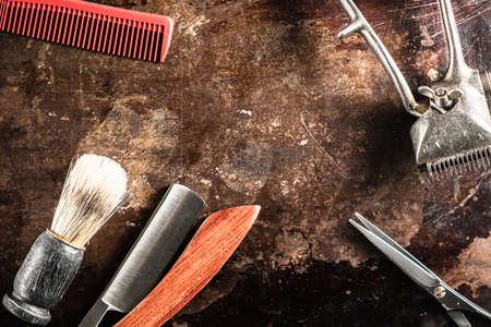 barber tools hairdressing scissors vintage manual clipper comb brush dangerous razor are on a on a...