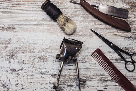 vintage barber tools dangerous razor hairdressing scissors old manual clipper comb shaving brush.の写真素材