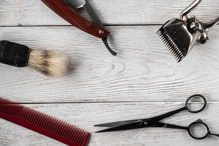 vintage barber tools dangerous razor hairdressing scissors old manual clipper comb shaving brush.の写真素材