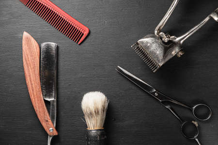 vintage barber tools dangerous razor hairdressing scissors old manual clipper comb shaving brush.の写真素材