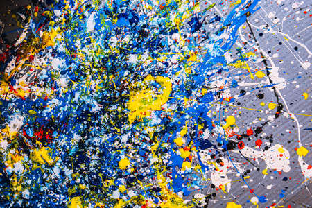 abstract expressionism. contemporary art. Picture painted using the technique of dripping. Mixing different colors red yellow blue white black. A riot of color. Lines and spots. Horizontal orientation.の写真素材