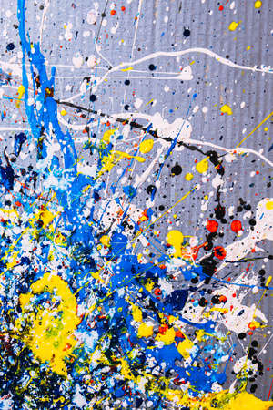 abstract expressionism. contemporary art. Picture painted using the technique of dripping. Mixing different colors red yellow blue white black. A riot of color. Lines and spots. Vertcal orientation.の写真素材