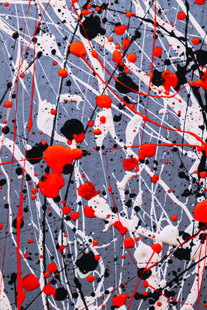 Abstract expressionism. Picture painted using the technique of dripping. Mixing different colors red white black. Japanese colors. Lines and spots. Vertical orientation.の写真素材