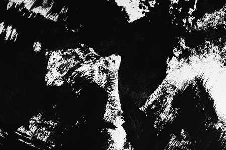 Patterns of black paint from a brush on a white background. horizontal orientation