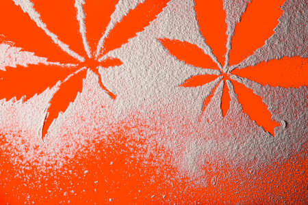 on white flour traces of cannabis leaves can be seen on Lush Lava. Horizontal orientation.の写真素材