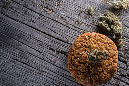 biscuits with hemp on an old wooden background close-up. rustic. Horizontal orientation.の写真素材