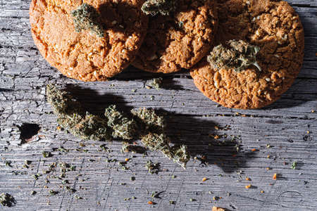biscuits with hemp on an old wooden background close-up. rustic. Horizontal orientation.の写真素材