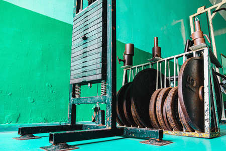 Old rusty gym equipment in strom room. Horizontal orientationの写真素材