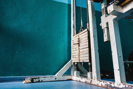 Old rusty gym equipment in strom room. Horizontal orientation