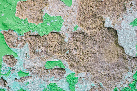 Old dirty painted wall. Several layers of peeling paint. background texture. Horizontalの写真素材
