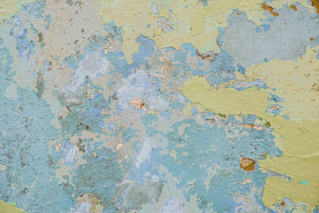 Old dirty painted wall. Several layers of peeling paint. rusty blur. background texture. Horizontalの写真素材