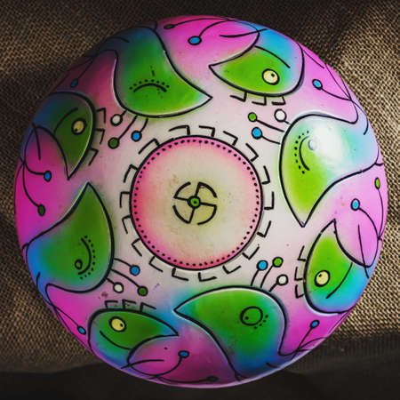 colors steel Tongue Drum, Vadjraghanta, Tank Drum for Sound Waves Therapy and Meditation, Healing. Close-up modern musical instrument Hand pan or metal tongue drumon highly artistic productの写真素材