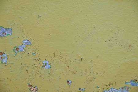 Old dirty painted wall. Several layers of peeling paint. rusty blur. background texture. Horizontalの写真素材