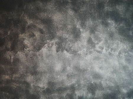 Refined gray textured background. Stains and streaks are present. Dark and light areas. Fine grain.