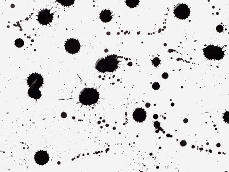 Picture painted using the technique of dripping. Mixing different colors white and blackの写真素材