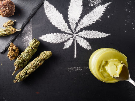 cannabis butter and medical marijuana bud. flat lay. top view.の写真素材