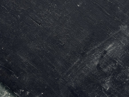 Black wall texture rough background dark painted with a rough brushの写真素材