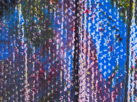 Bright colors and swirling patterns create an engaging abstract texture. Various hues blend harmoniously, inviting viewers to explore the depth and movement present in the artwork.の写真素材