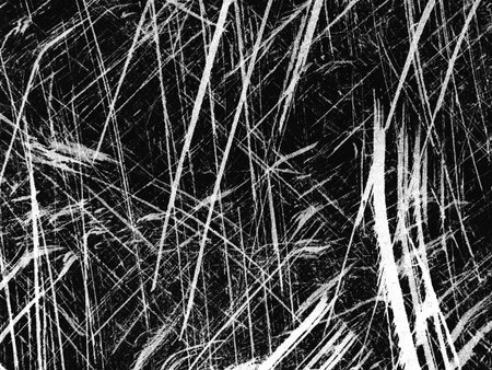 A detailed pattern of black and white lines and scratches forms an abstract texture. The piece evokes a sense of movement and depth, capturing the viewer's attention.の写真素材