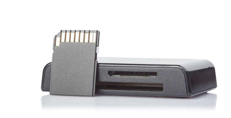 card reader and memory card on white background