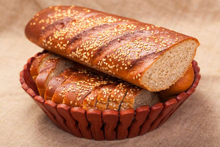 The closeup of baguette with seeds