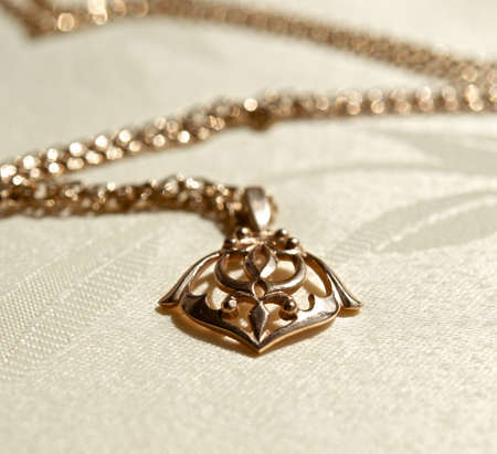 Gold pendant の写真素材