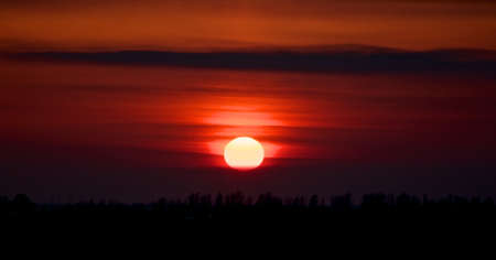 Crimson sunset の写真素材