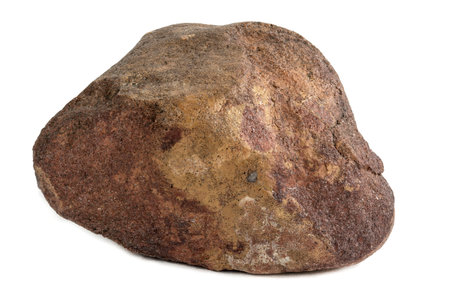 A stone on a white background. A piece of red graniteの写真素材