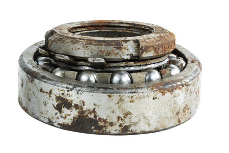 Bearing on a white background. Old worn bearing covered with rustの写真素材