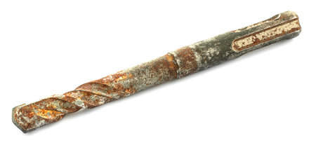 An old drill bit on a white backgroundの写真素材
