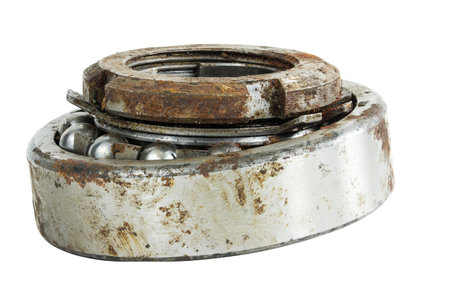 Bearing on a white background. Old worn bearing covered with rustの写真素材