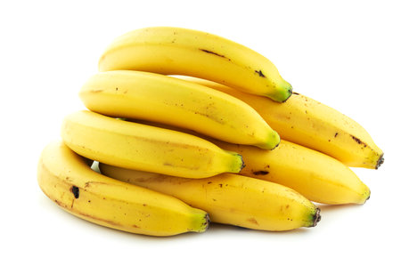 Yellow bananas on a white backgroundの写真素材