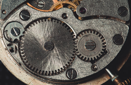 The mechanism of an antique clock close-upの写真素材