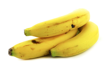 Yellow bananas on a white backgroundの写真素材