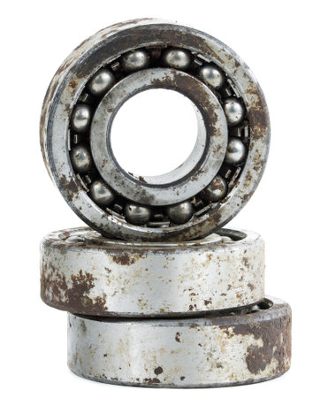 Bearing on a white background. Old worn bearing covered with rustの写真素材