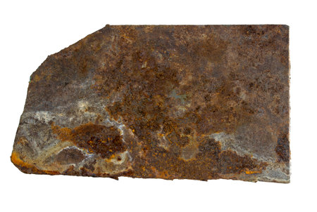 Metal sheet covered with rust on a white backgroundの写真素材